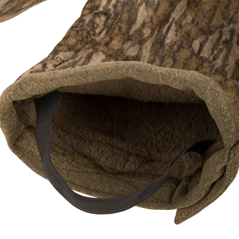 Alt text: Silencer Soft Shell Pant with Agion Active XL, featuring ultra-quiet fabric, scent control, and adjustable waist and ankles.