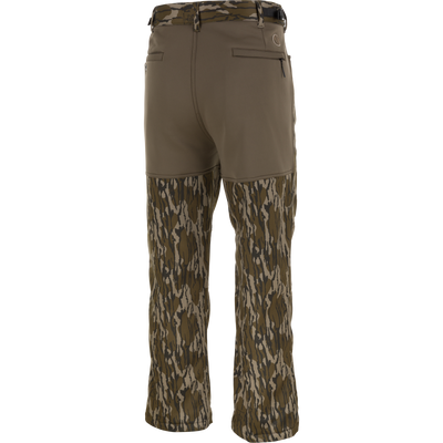 Back view of the Non-Typical Endurance Pant with Scent Control by Nontypical, featuring solid brown upper, camo lower legs, belt loops, two back pockets, and built-in odor control.