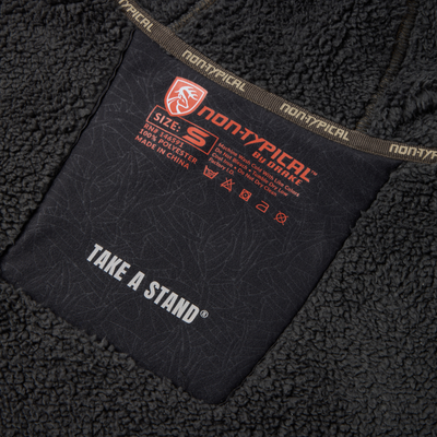 Inside label of Non-Typical Silencer Hoodie with Agion Active X2, highlighting size, material, care instructions, and advanced features for hunting performance.