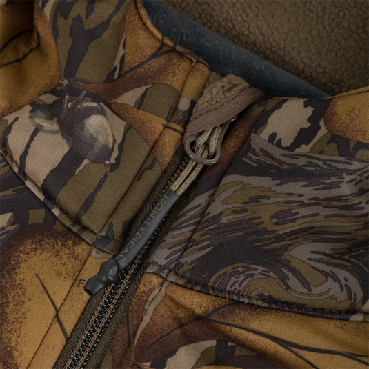Close-up of a Non-Typical Endurance Hooded Full Zip Jacket with Scent Control, featuring a mid-season camouflage pattern, a zippered front, and fuzzy lining.