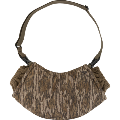 Camouflage-patterned hand warmer with a strap on a white background