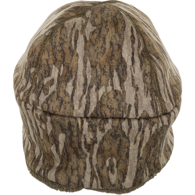The Non-Typical Silencer Sherpa Fleece Beanie by Nontypical features a brown and tan camo pattern, ear flaps, and silencer fabric, shown from above on a white background.