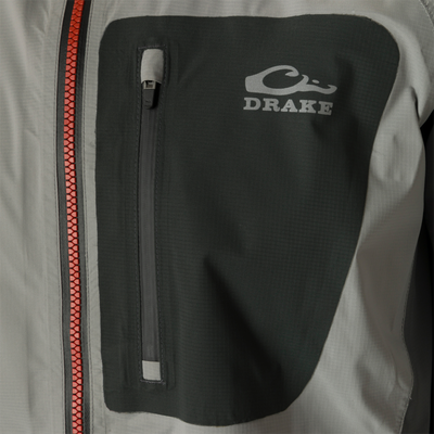 Ultra-Lite Backwaters Waterproof Stretch Jacket, featuring a close-up of the Vislon center front zipper and reflective logos, highlighting its waterproof and breathable design.