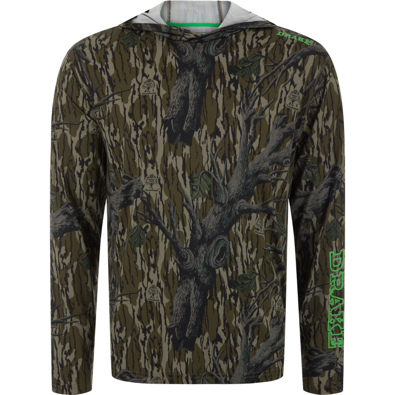 Lake Shore Performance Long Sleeve Hoodie in treestand camo with DRAKE on the sleeve, featuring cooling technology, UPF 50, and moisture-wicking fabric.