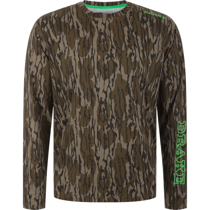 Lake Shore Performance Long Sleeve Crew, a camouflage hunting shirt with DRAKE branding, features moisture-wicking, quick-drying fabric and UPF 50 sun protection.