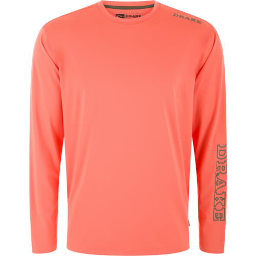 Lake Shore Performance Long Sleeve Crew in coral with DRAKE on shoulder and sleeve, featuring moisture-wicking fabric and UPF 50 protection, ideal for outdoor activities.