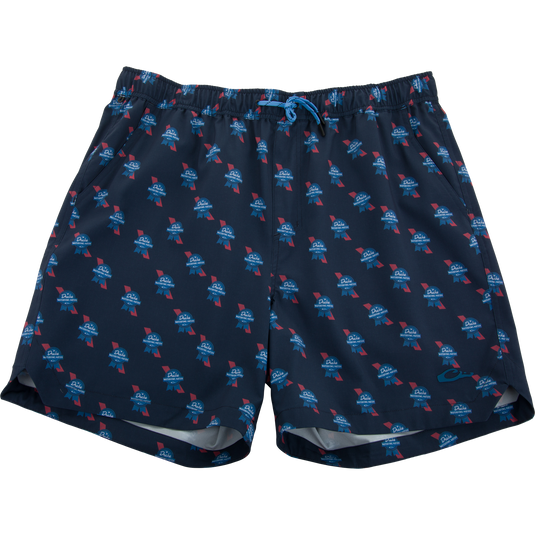 Americana Lake Shore Dock Short, navy boardshorts with Duke Waterfowl Nation emblem, elastic waistband, drawstring, and mesh-lined pockets for comfort and functionality.