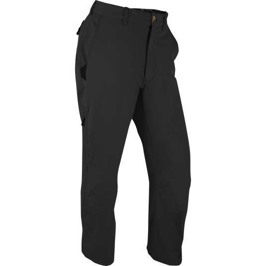 Alt text: Stretch Tech Pants by Drake Waterfowl: Durable black trousers with YKK zippers, cargo pockets, and moisture-wicking 4-way stretch for hunting and outdoor activities.
