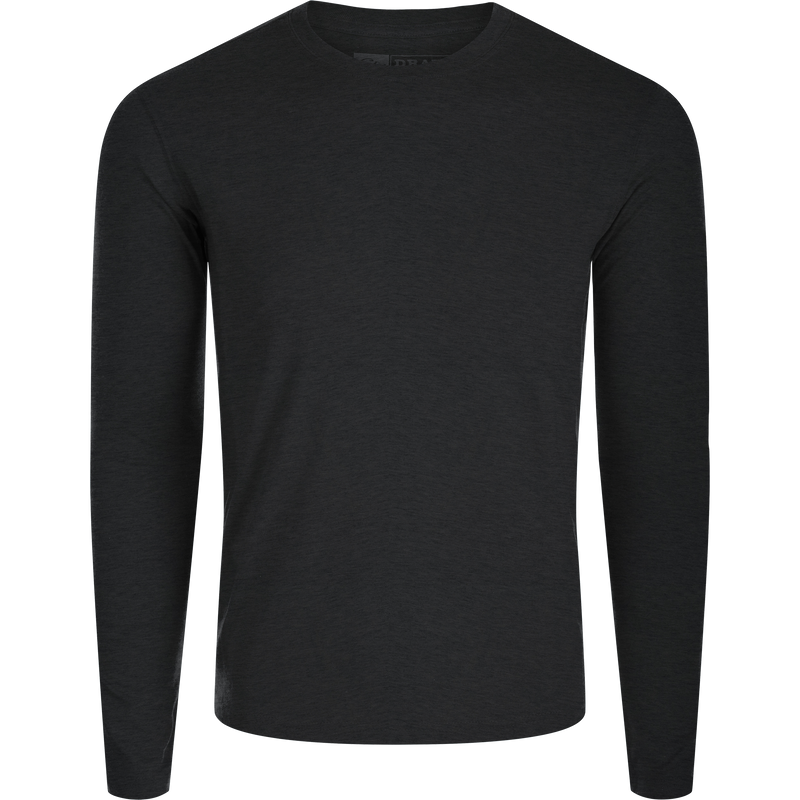 Hunter Creek Bamboo Long Sleeve Crew, a plain dark shirt with crew-neck and long sleeves, designed for comfort and year-round use with breathable, quick-drying fabric.