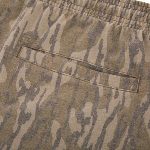 Close-up of the Tri-Blend Campus Short with camo-print, featuring an elastic waistband and welt pocket, highlighting its soft, stretchy, and quick-drying fabric.