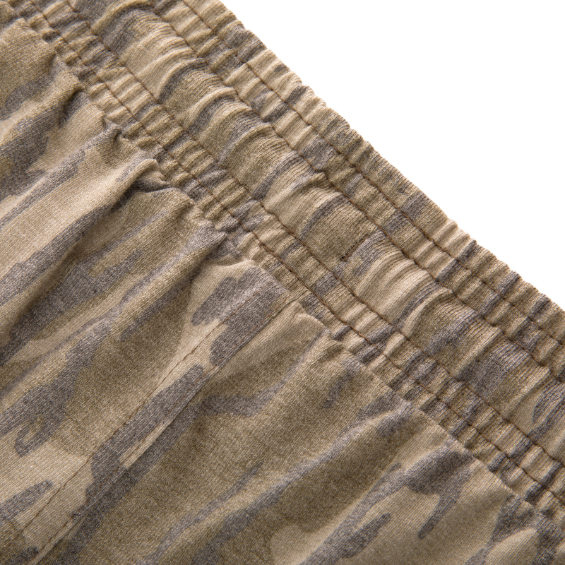 Close-up of the Tri-Blend Campus Short's elastic waistband, showcasing its soft cotton-poly-rayon blend and camouflage print, emphasizing comfort and flexibility for casual wear.