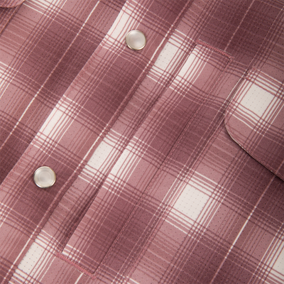 Close-up of the Cinco Ranch Western Plaid Long Sleeve Shirt, highlighting the unique fabric texture and faux pearl snap button details.