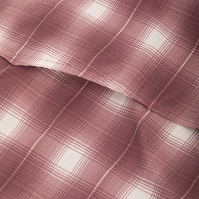 Close-up of the Cinco Ranch Western Plaid Long Sleeve Shirt showcasing its pink and white plaid micro-mesh fabric, highlighting texture and weave.