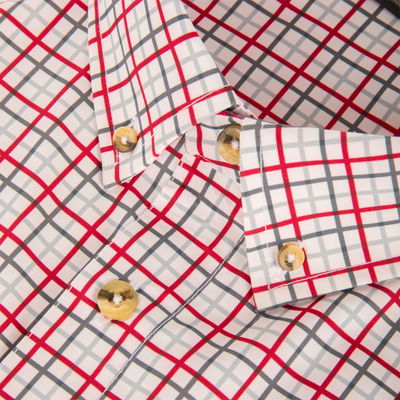 Close-up of a Lifestyle Frat Tattersall Button-Down Long Sleeve Shirt featuring a red, grey, and white check pattern with light brown buttons.