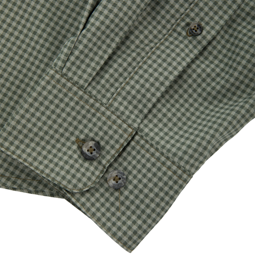 Close-up of the Frat Gingham Check Button-Down Long Sleeve Shirt cuff, showcasing green-and-off-white houndstooth fabric, two grey buttons, and precise placket stitching.