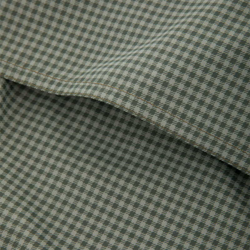 Close-up of the Drake Frat Gingham Check Button-Down Long Sleeve Shirt, featuring olive green houndstooth fabric with visible stitching, highlighting its refined craftsmanship.