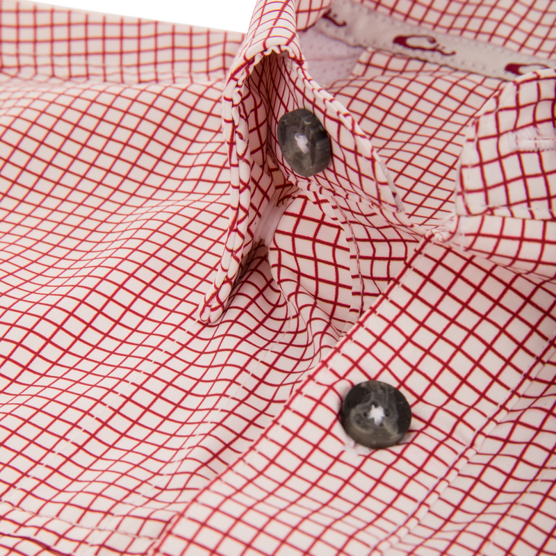 Close-up of the Wingshooters Trey Grid Check Short Sleeve Shirt, featuring a fine red grid pattern, smoky gray buttons, and a button placket.