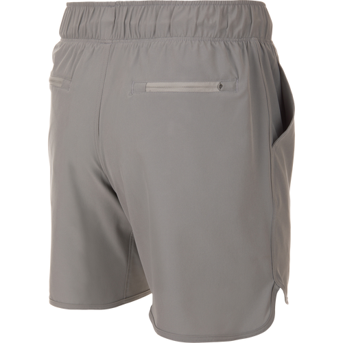 Drake Commando Lined Volley Short 7in features a quick-dry liner, elastic waistband, and zippered pockets, ideal for versatile outdoor activities.