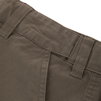 Close-up of the 9 Pocket Ripstop Short's waistband, showcasing belt loops and stitching. Designed for adventure with ripstop fabric and nine pockets for versatility.