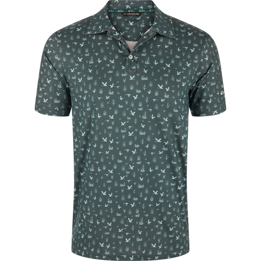 Marsh Duck Polo featuring a deep olive-green hue with light-green flying ducks and marsh grasses pattern, classic collar, and two-button placket in a performance fabric.