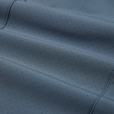 Close-up of Lake Shore Performance Short Sleeve Shirt fabric, highlighting its lightweight, stretchable polyester/spandex blend designed for outdoor activities with added technical features.