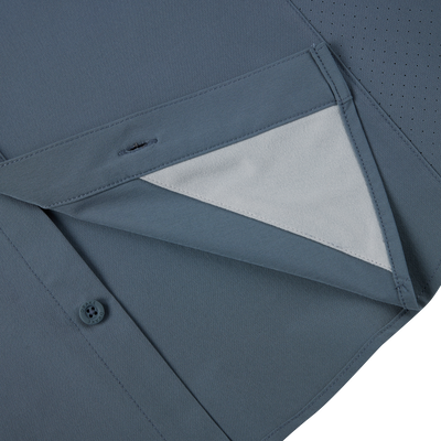 Lake Shore Performance Short Sleeve Shirt featuring a hidden button-down collar, two flap chest pockets, and vented cape back with technical enhancements for outdoor activities.