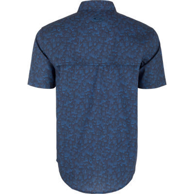 Cotton Marsh Print Short Sleeve Shirt with bird and plant pattern, featuring button-down collar, flap pockets, and sculpted hem, ideal for versatile, active wear.