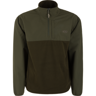 The Waterfowl MST Quarter Zip Refuge Eqwader Jacket features an olive green dual-tone design, chest zip pocket, high collar, oval logo patch, and long sleeves—ideal for layering with breathable waders.