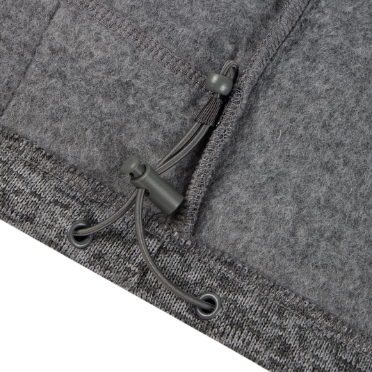 Close-up of the Fall Brake Sweater Fleece Vest by Sale, showing its gray fleece fabric, adjustable drawstring with plastic toggles, and detailed stitching along the seam and hem.