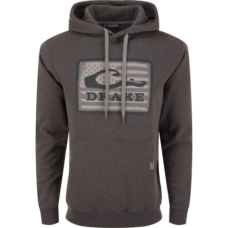 Drake Graphic Work Hoodie with front logo, hood with heavy drawstring, kangaroo pocket, and side panels for flexibility. Constructed from a cotton-polyester blend.