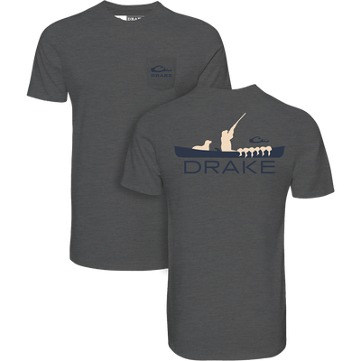 The Lifestyle Boat Bust T-Shirt in Graphite Heather features a small logo and Drake on the front, with a back graphic of a person fishing with four dogs and DRAKE below the image.