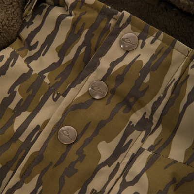 Throwback 80 Sport Vest with tiger-stripe camo, waterproof fabric, fleecy lining, metal snap buttons, ideal for outdoor adventures.