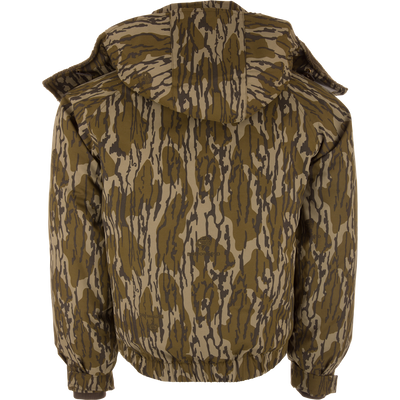 Back view of the Throwback 80 Sport 3-in-1 Jacket with a tiger-stripe camo pattern, featuring a hood, ribbed cuffs, and hem for versatile all-weather protection.