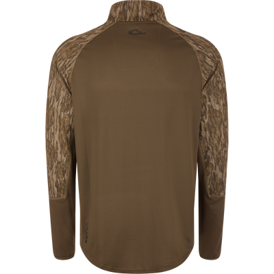 Back view of the EST Offset 1.0 Half Zip Pullover, featuring bark-style camouflage on shoulders, ergonomic thumbholes, and a small logo near the hem.