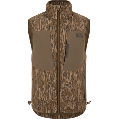 LST BMF Vest with Primaloft in Mossy Oak Bottomland camo, featuring a zip front, two chest pockets, and an adjustable hem for versatile hunting layering.