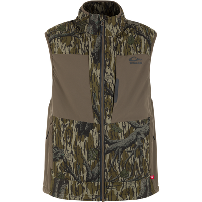 The LST BMF Vest with Primaloft by Waterfowl features PrimaLoft insulation, a zippered front, stand-up collar, and two chest pockets in Mossy Oak Original Treestand—ideal for outdoor or hunting use.