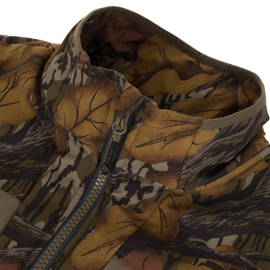 Close-up of a camouflage-patterned Drake X Ducks Unlimited LST BMF Vest with Primaloft featuring a high collar and a central zipper.