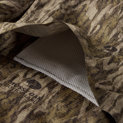 EST Wingshooter Trey Long Sleeve Shirt, featuring a hidden button-down collar, vented back, and multiple pockets, designed for outdoor activities with UPF 30 protection and moisture-wicking fabric.