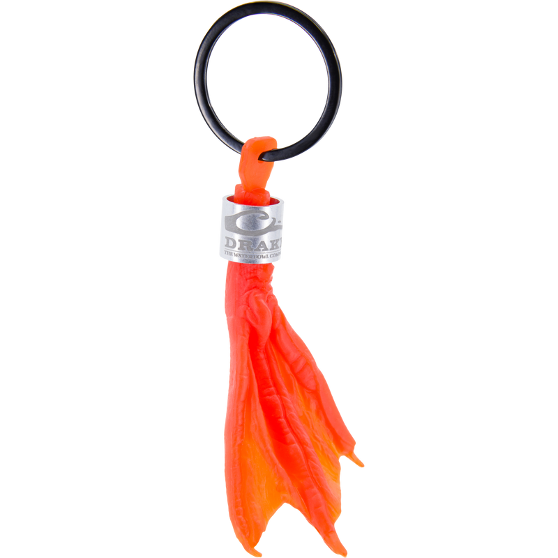 Duck Foot Key Chain: A molded-silicone, webbed-foot decoy weight with DRAKE metal collar and black O-ring, ideal for hunters and outdoors enthusiasts.