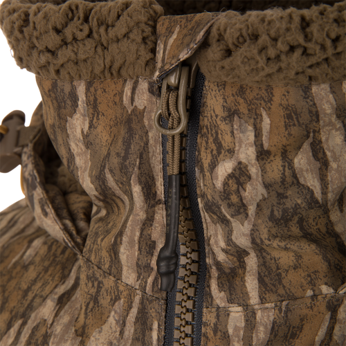 LST BMF Eqwader Half Zip Jacket with Primaloft, featuring a camo pattern, heavy-duty zipper with corded pull tab, and fleece-lined collar for warmth and durability.