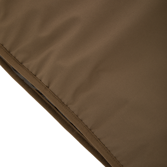 Close-up of the LST BMF Eqwader Half Zip Jacket with Primaloft, showcasing quilted, insulated fabric with a diagonal seam, ideal for warmth and weather resistance.