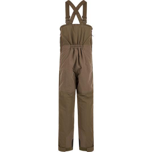 Back view of olive green Drake X Ducks Unlimited LST BMF Pit Bib with Primaloft waterproof hunting overalls, featuring adjustable shoulder straps with branded webbing and an elasticated waist.