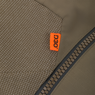 Olive green Drake X Ducks Unlimited LST BMF Pit Bib with Primaloft featuring a heavy-duty zipper and an orange D3O tag.