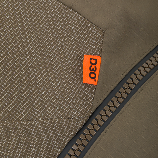 Olive green Drake X Ducks Unlimited LST BMF Pit Bib with Primaloft featuring a heavy-duty zipper and an orange D3O tag.