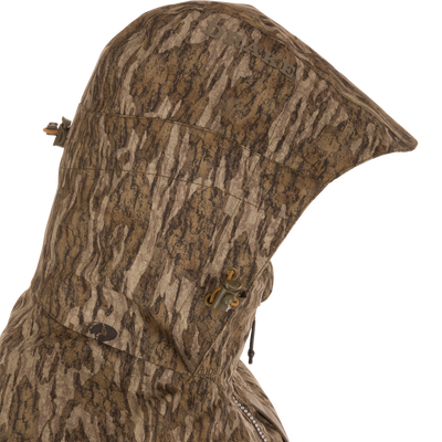 The LST BMF 3-in-1 Pit Jacket features a camo hood with Drake logo, adjustable drawcords, and sherpa fleece lining for warmth.