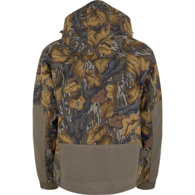 Back view of a Drake X Ducks Unlimited LST BMF 3-in-1 Pit Jacket with Primaloft, featuring a hooded camouflage design with a solid olive-green panel on the lower back and forearms.