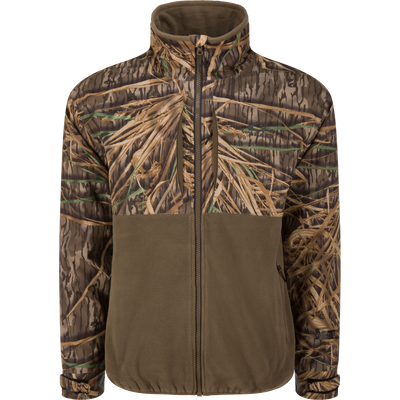The Waterfowl MST CommandXT Eqwader Full Zip Jacket in Mossy Oak Original Shadow Grass features a durable fleece build with camo on the upper half and sleeves, and solid olive green on the lower half and collar, shown on white.