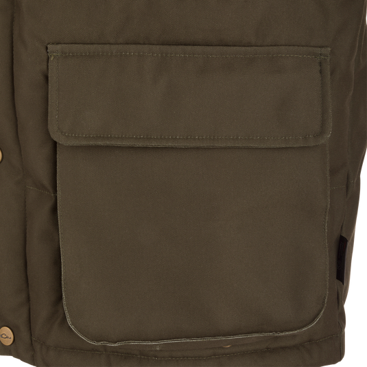 Close-up of the Throwback 80 Featherless Puffer Jacket's olive-green canvas front pocket with flap and snap-button, showcasing its durable and functional design.
