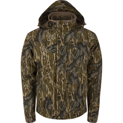 The LST Hardline 3-in-1 Jacket by Waterfowl in Mossy Oak Original Treestand features a high collar, front zipper, button closures, and synthetic down insulation, shown against a white background.