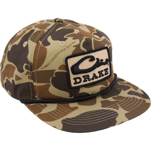 Drake X LOST Goat Rope Cap with camo pattern, woven Drake patch, and unique 550 paracord detail, embodies rugged style and adjustable comfort.
